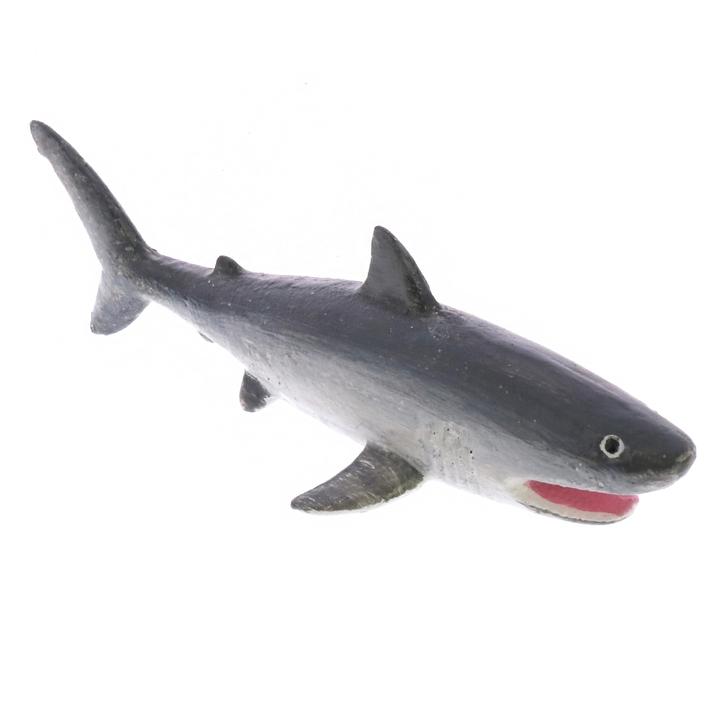 Metal shark bottle opener, dark gray with red mouth and small eye hole.