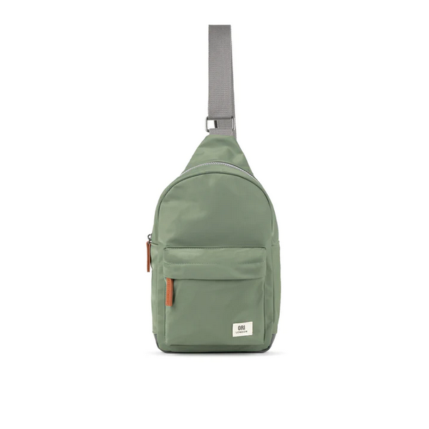Large sage green recycled nylon sling bag with adjustable strap and front zip pocket