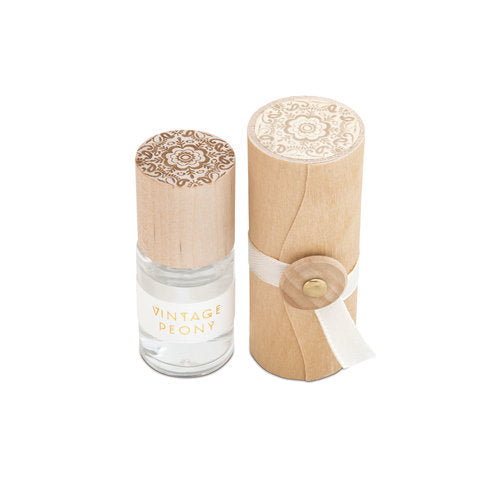 Vintage peony rollerball perfume bottle with carved wooden cap and clear glass base
