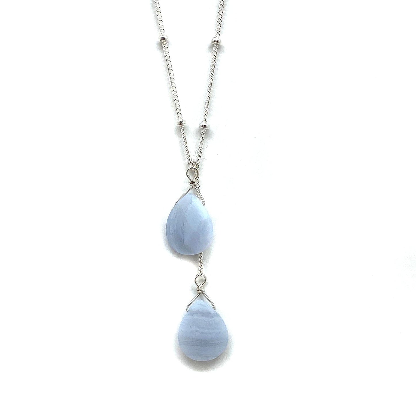 Sterling silver lariat necklace with two pale blue teardrop stones