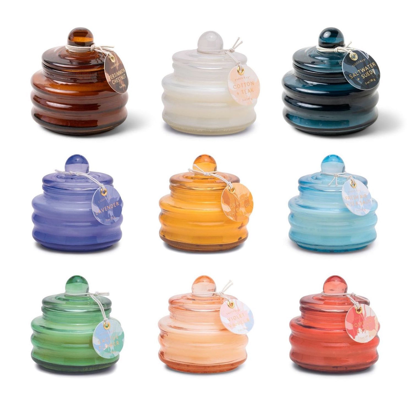 Beam candle collection in colorful glossy glass jars with round lids and hanging tags