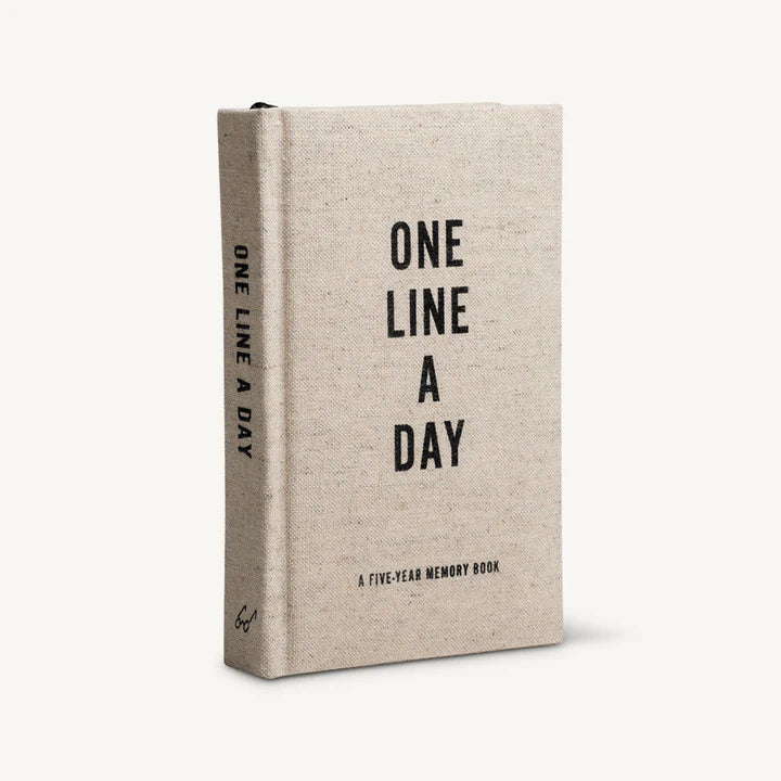 Beige canvas memory journal book cover, 'ONE LINE A DAY' text