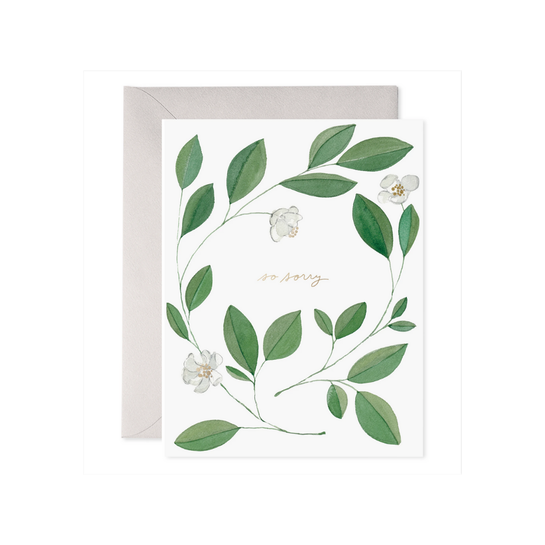 Botanical condolence card with green leaves and white flowers on a white background