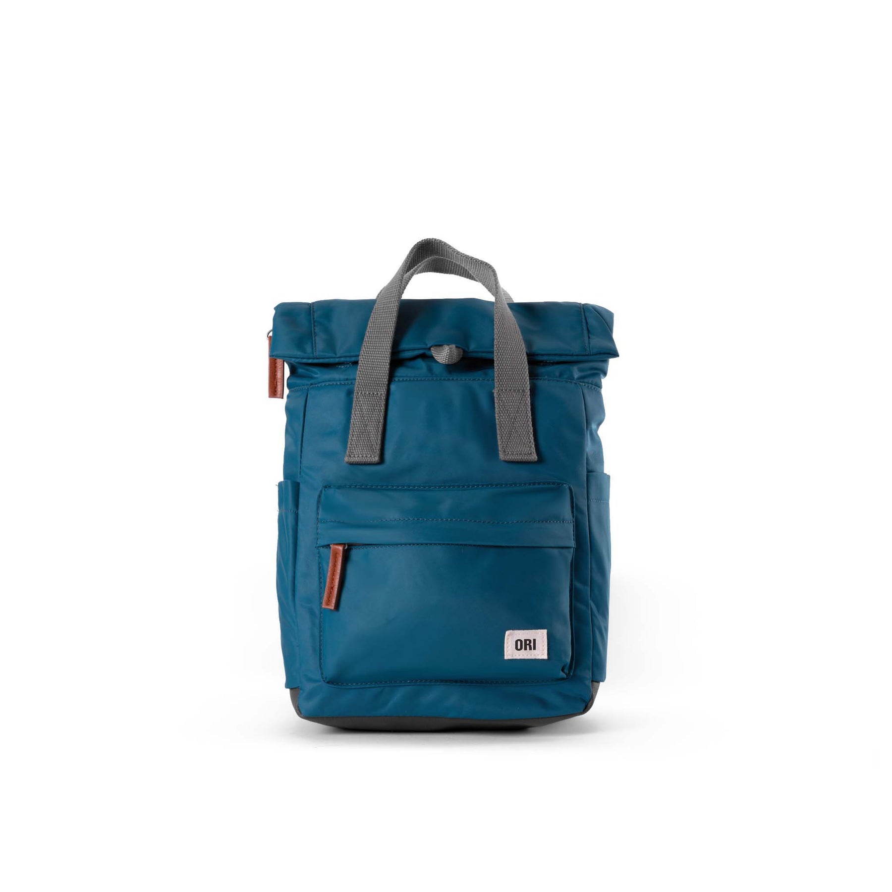Blue nylon backpack, top handle and front zip pocket with small brand patch.