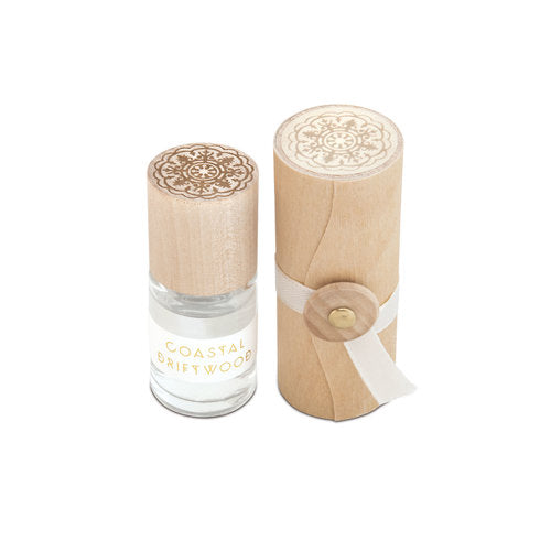 Coastal driftwood rollerball perfume bottle with carved wooden cap and clear glass base