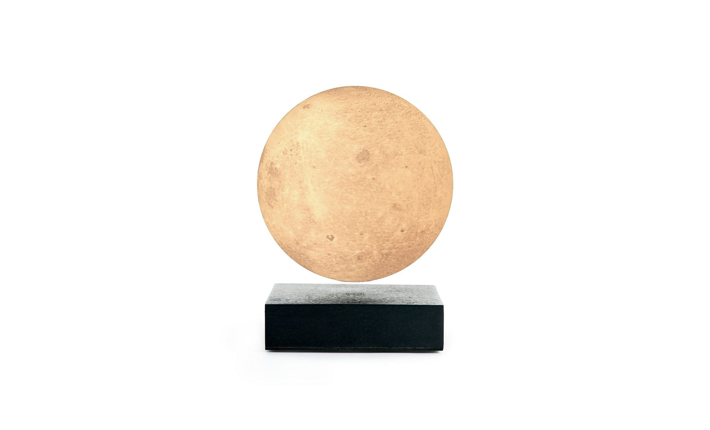 Moon-shaped lamp with warm glowing sphere and black base