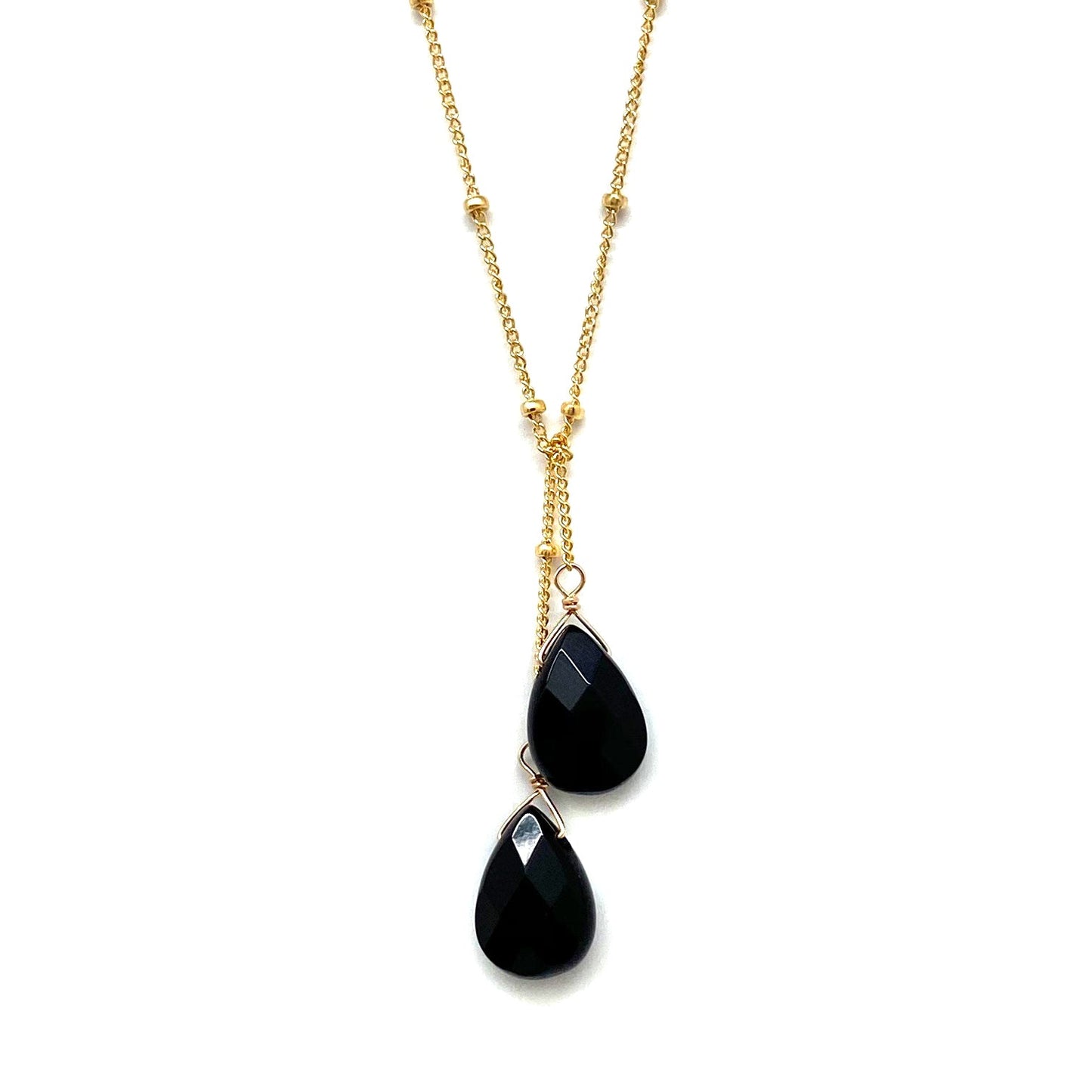 Gold-filled lariat necklace with two black teardrop stone drops