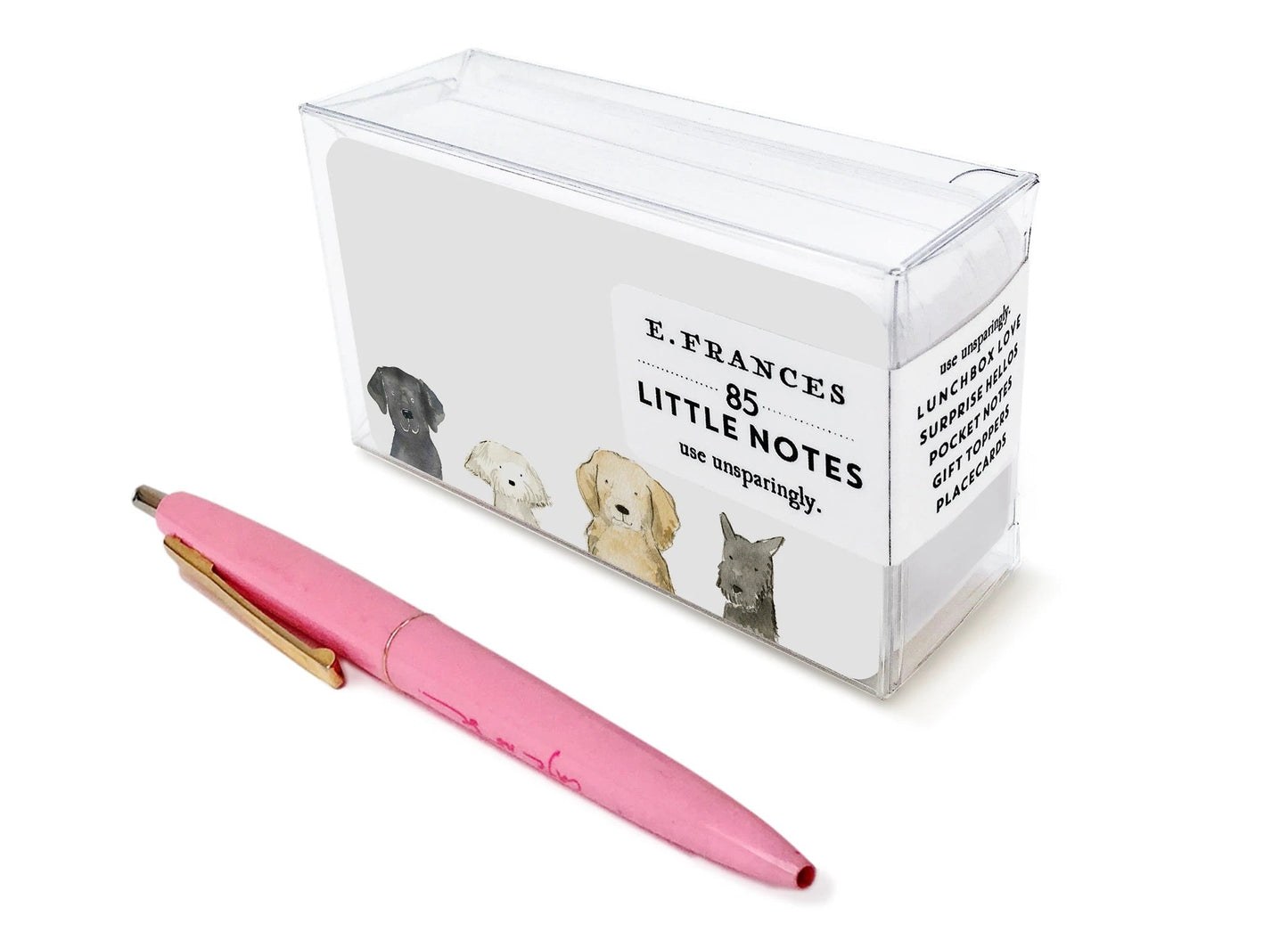 Clear note box with dog artwork and pink pen for size reference