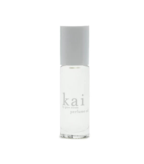 Kai perfume oil bottle with clear glass body and white cap