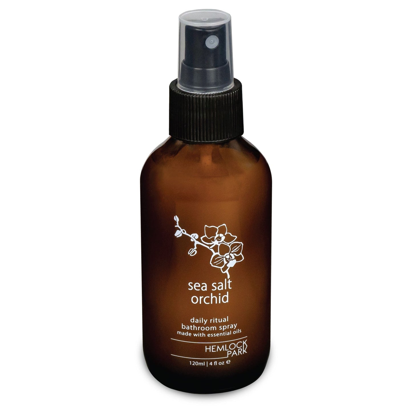 Room spray bottle with sea salt orchid label, amber glass, black ribbed mist nozzle