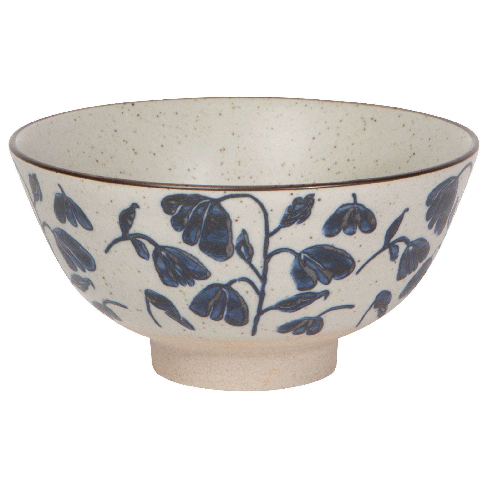 Large ceramic bowl, speckled off-white with blue floral pattern