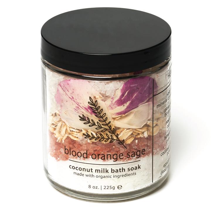 Coconut milk bath soak jar with dark lid and blood orange sage label