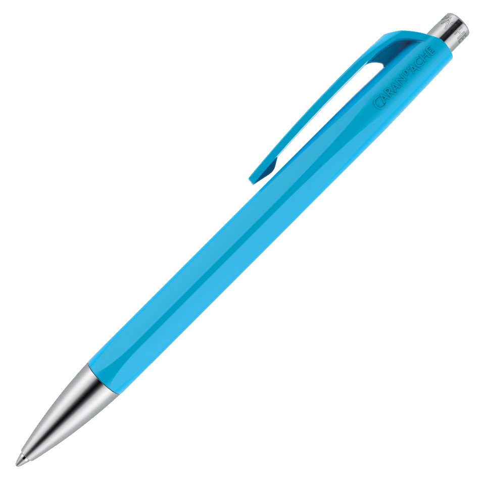 Blue-green (turquoise) ballpoint pen with silver tip and clip
