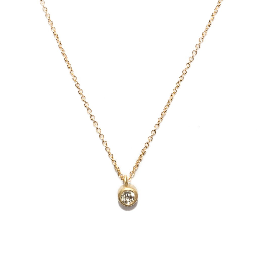 14k gold diamond pendant necklace with round bezel-set stone