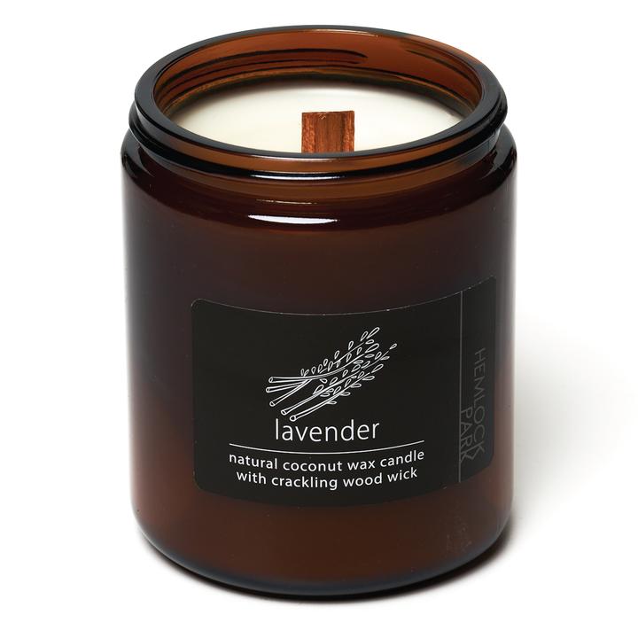 Organic coconut wax candle in amber jar, lavender label, wood wick