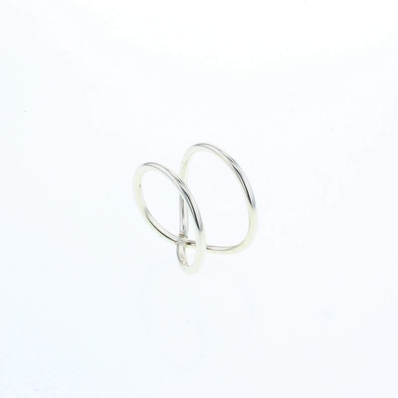 Sterling silver ring with overlapping oval loops, slim stacked bands