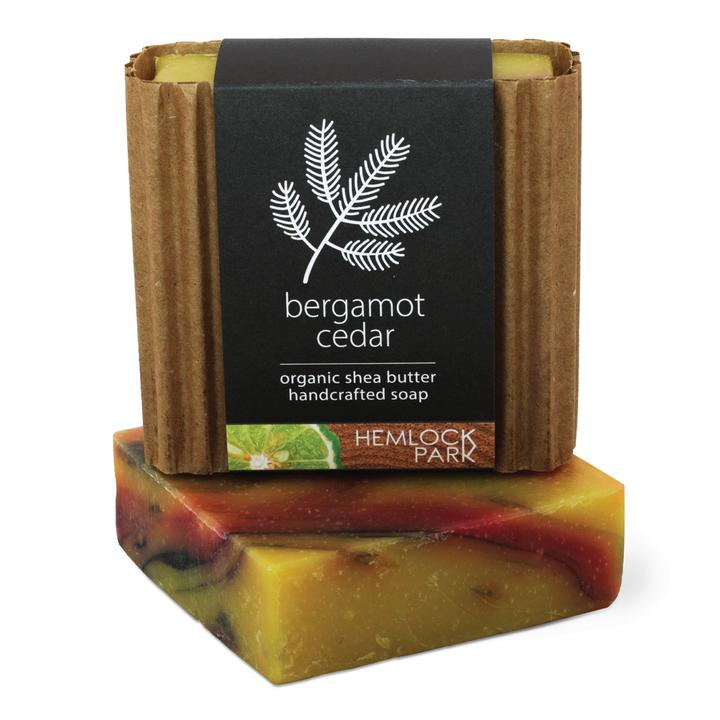 Organic shea butter soap, bergamot cedar, green bar with kraft wrap and label.