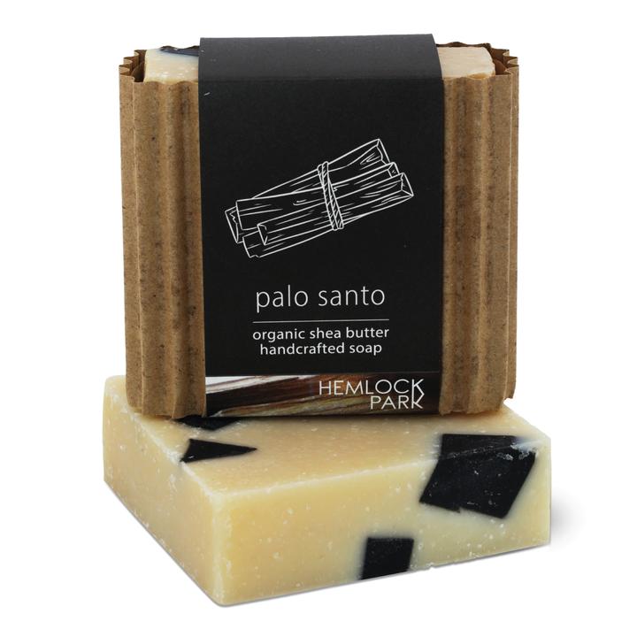 Organic shea butter soap, palo santo, cream bar with black specks, kraft wrap label.