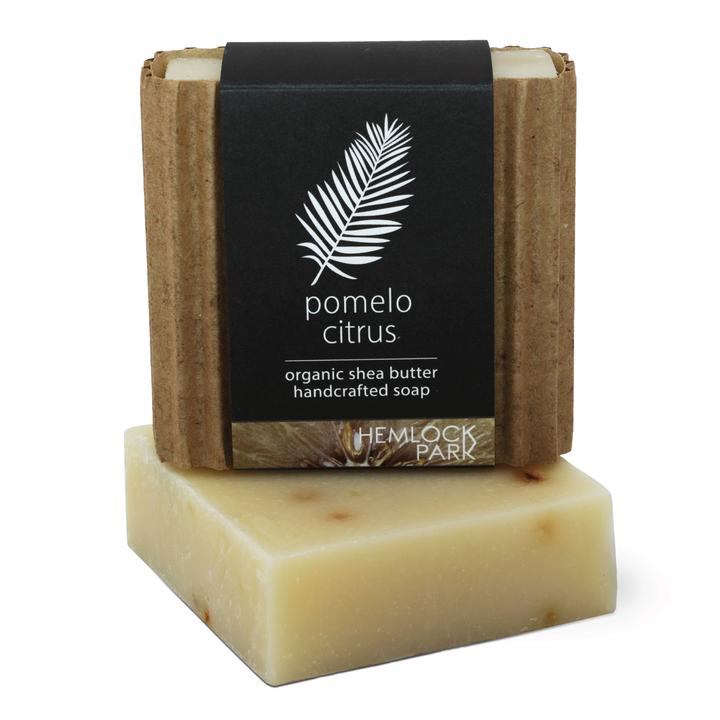 Organic shea butter soap, pomelo citrus, pale cream bar with kraft wrap and label.
