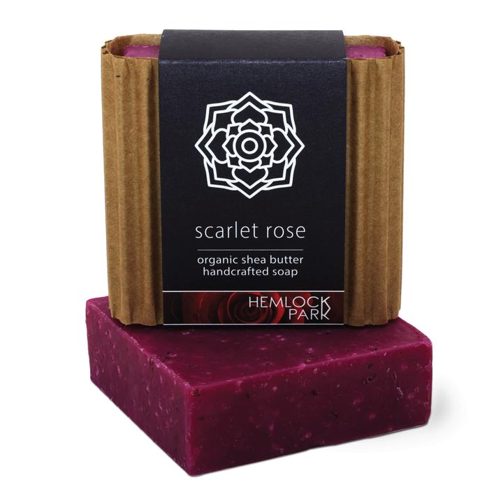 Organic shea butter soap, scarlet rose, deep magenta bar with kraft wrap and label.