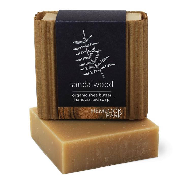Organic shea butter soap, sandalwood, tan bar with kraft wrap and label.