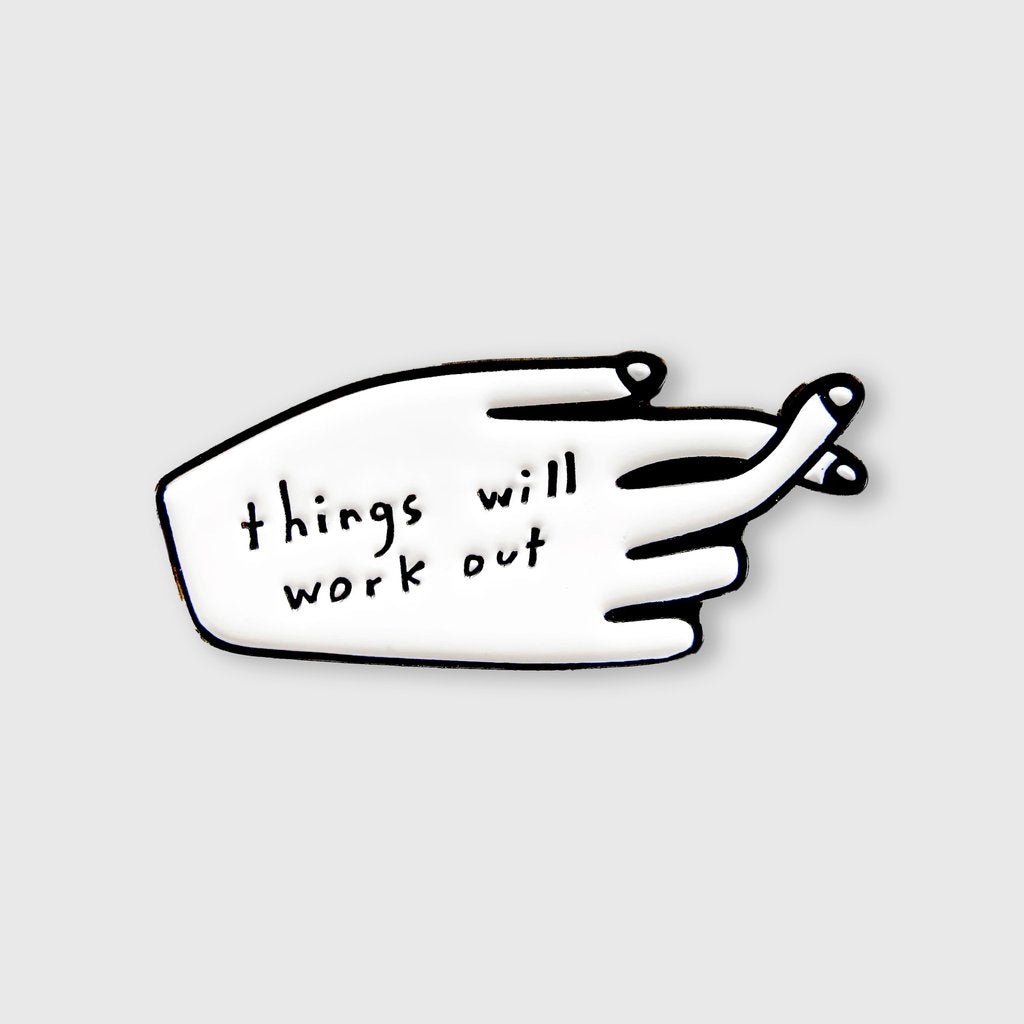 Things Will Work Out pin: white tag with black outline and hand graphic, text included