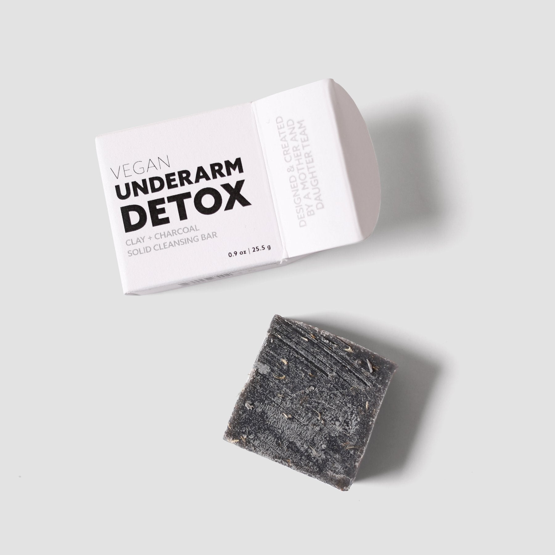 Mini underarm detox solid cleansing bar, charcoal clay, with white vegan box