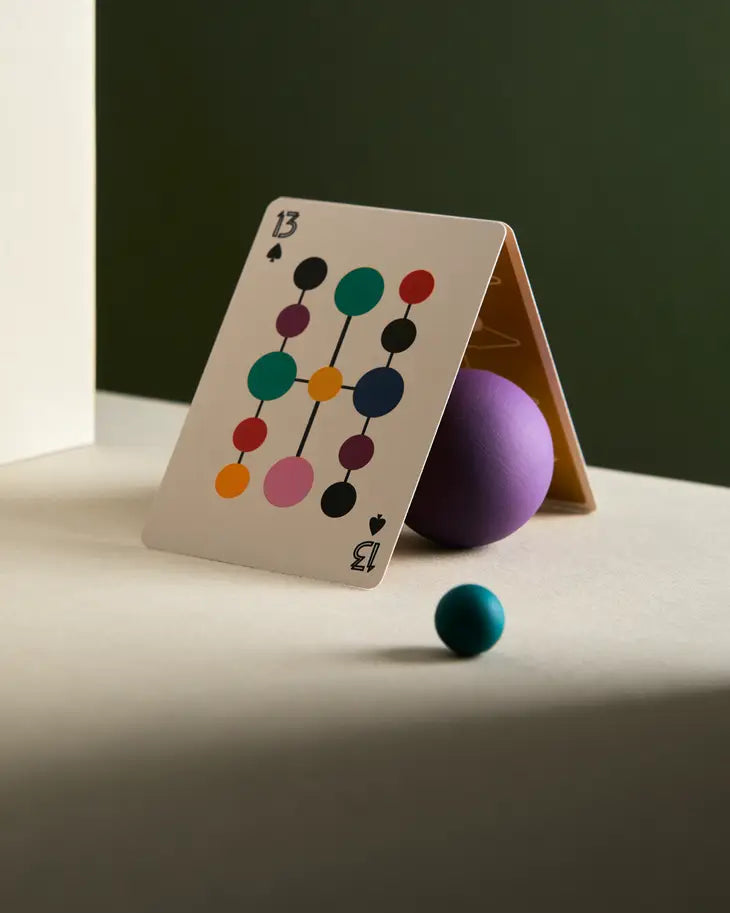 Playing card showing spade 13 with colorful circle nodes