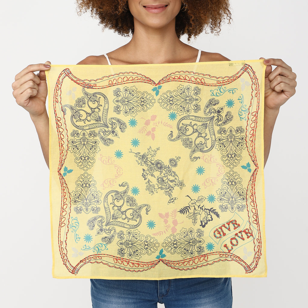 Yellow embroidered bandana with red border and multicolor paisley and floral motifs