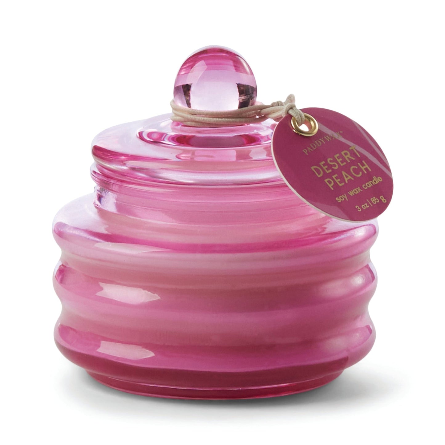 Desert peach-scent glass jar candle in pink with dome lid and round tag