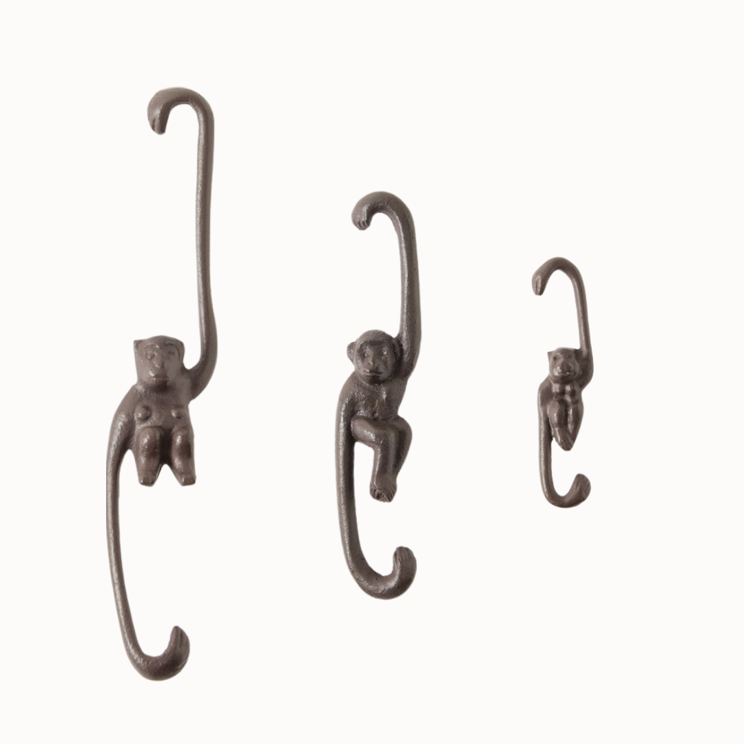 Cast iron monkey wall hooks, set of three, dark brown curved hanging ends