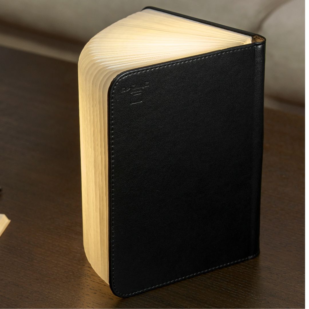 Black leather smart booklight with illuminated pages, compact standing cover