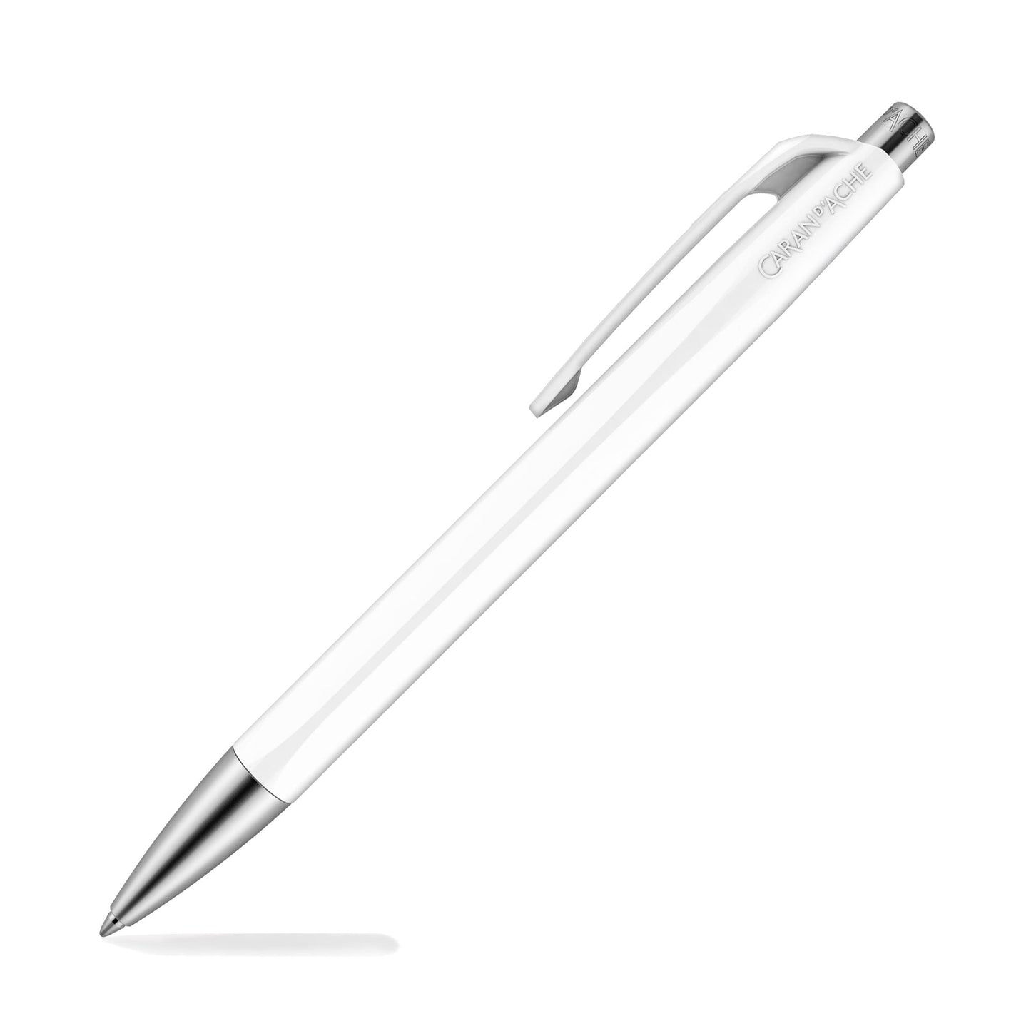 White ballpoint pen with silver tip and clip