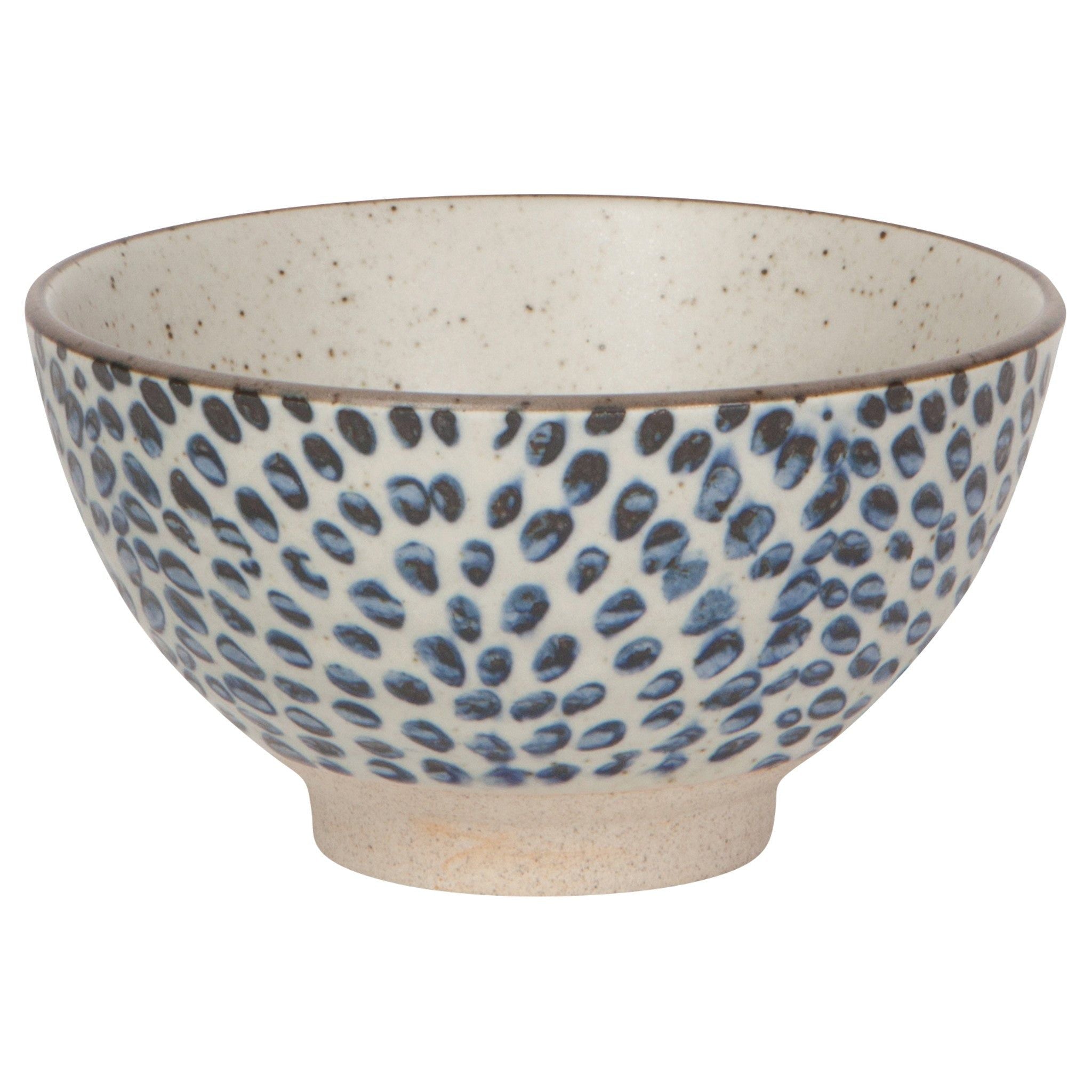 Small ceramic bowl with blue droplet pattern and speckled beige exterior