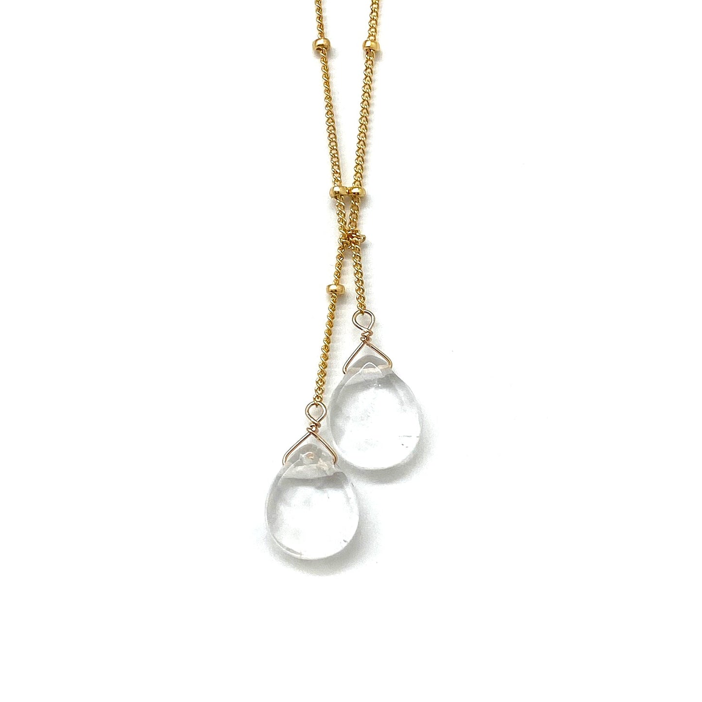 Gold-filled lariat necklace with two clear white teardrop stone drops