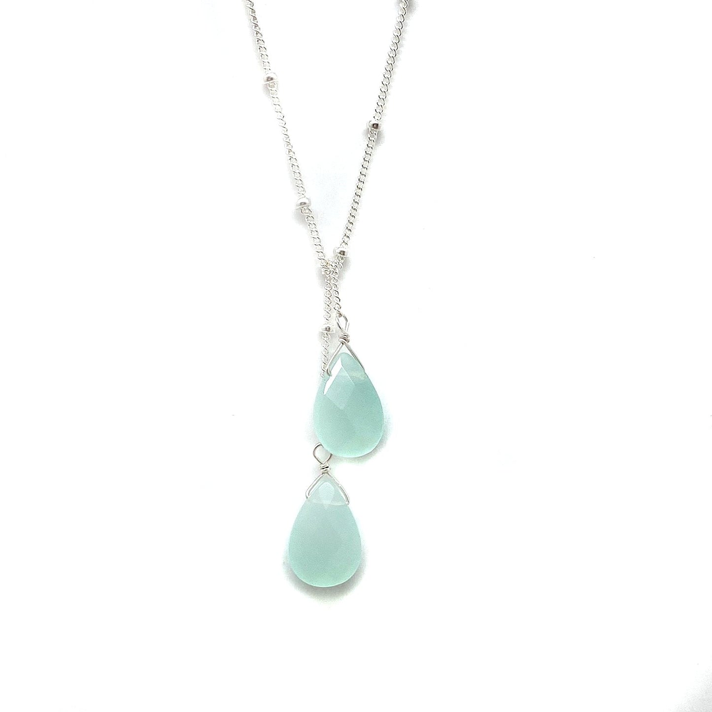 Sterling silver lariat necklace with two light aqua teardrop stones