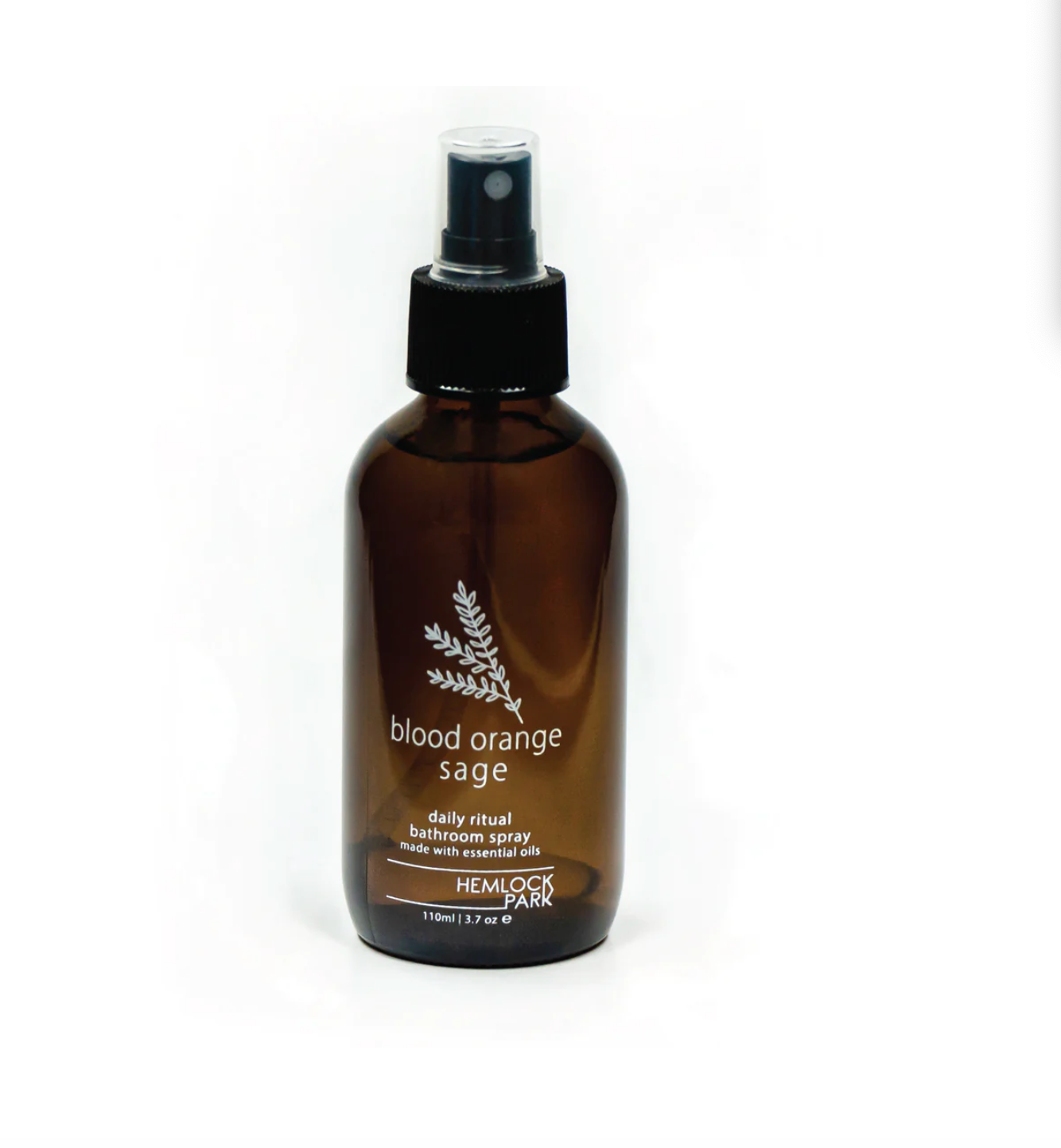 Room spray bottle with blood orange sage label, amber glass, black mist nozzle and cap