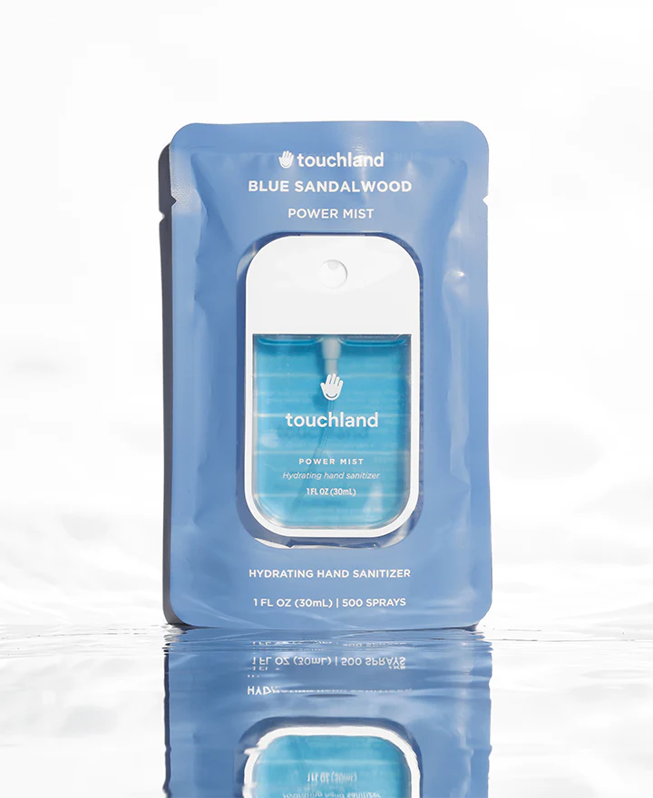 touchland Power Mist hydrating hand sanitizer pouch labeled BLUE SANDALWOOD, blue gel