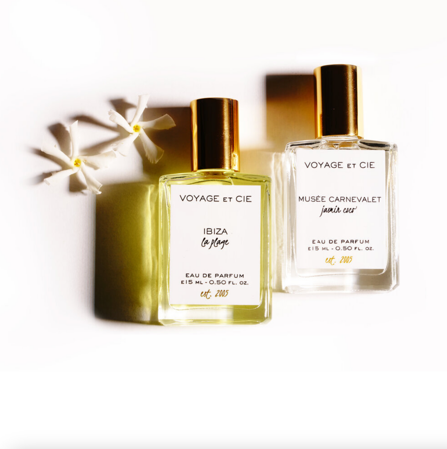 Roll-on perfume bottle with gold cap, clear glass and printed label, 15 ml