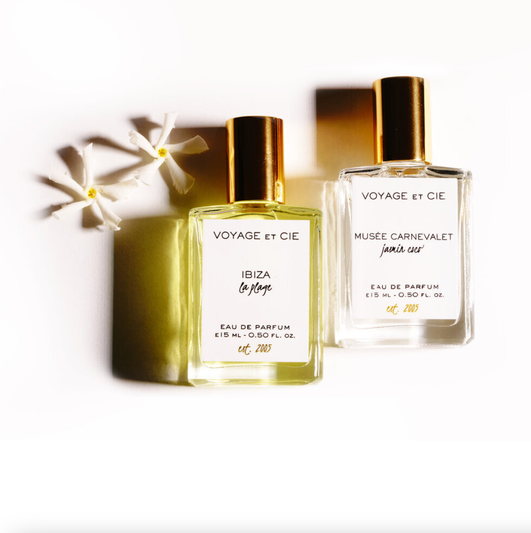 Roll-on perfume bottle with gold cap, clear glass and printed label, 15 ml