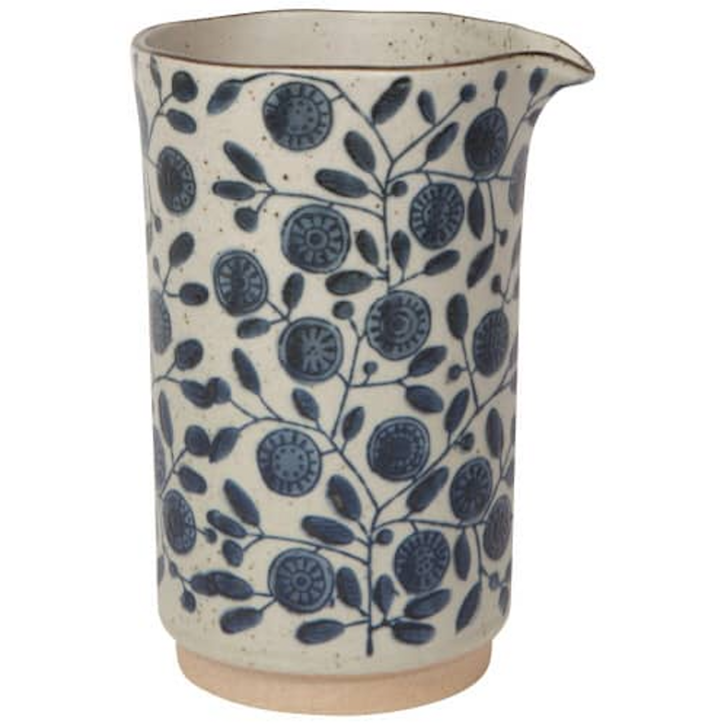 Ceramic pitcher with cream base and navy floral and circular pattern, speckled rim