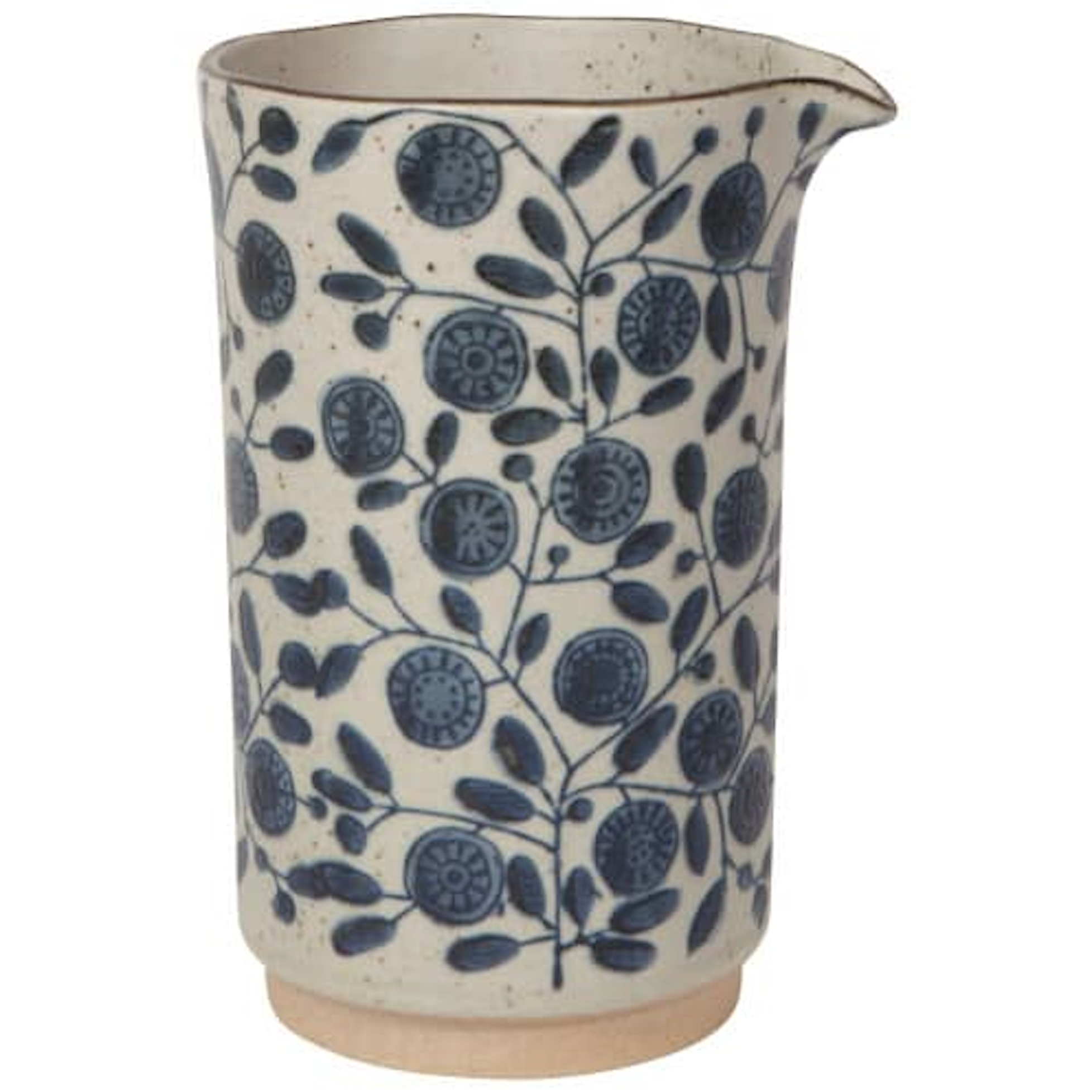 Ceramic pitcher with cream base and navy floral and circular pattern, speckled rim
