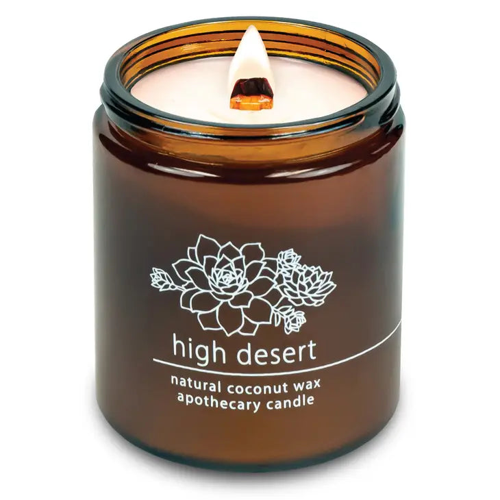Coconut wax candle in amber jar with wood wick, high desert scent label