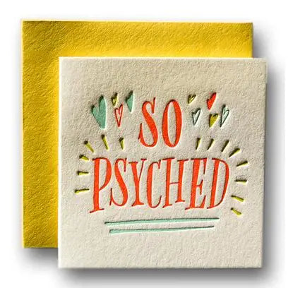 Psyched greeting card with textured white front and red/green lettering, in yellow envelope